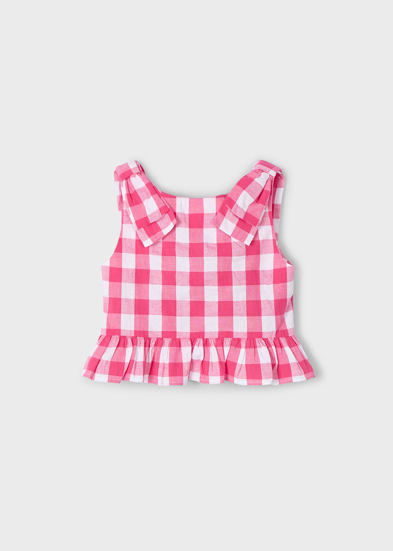 Peplum sleeveless top